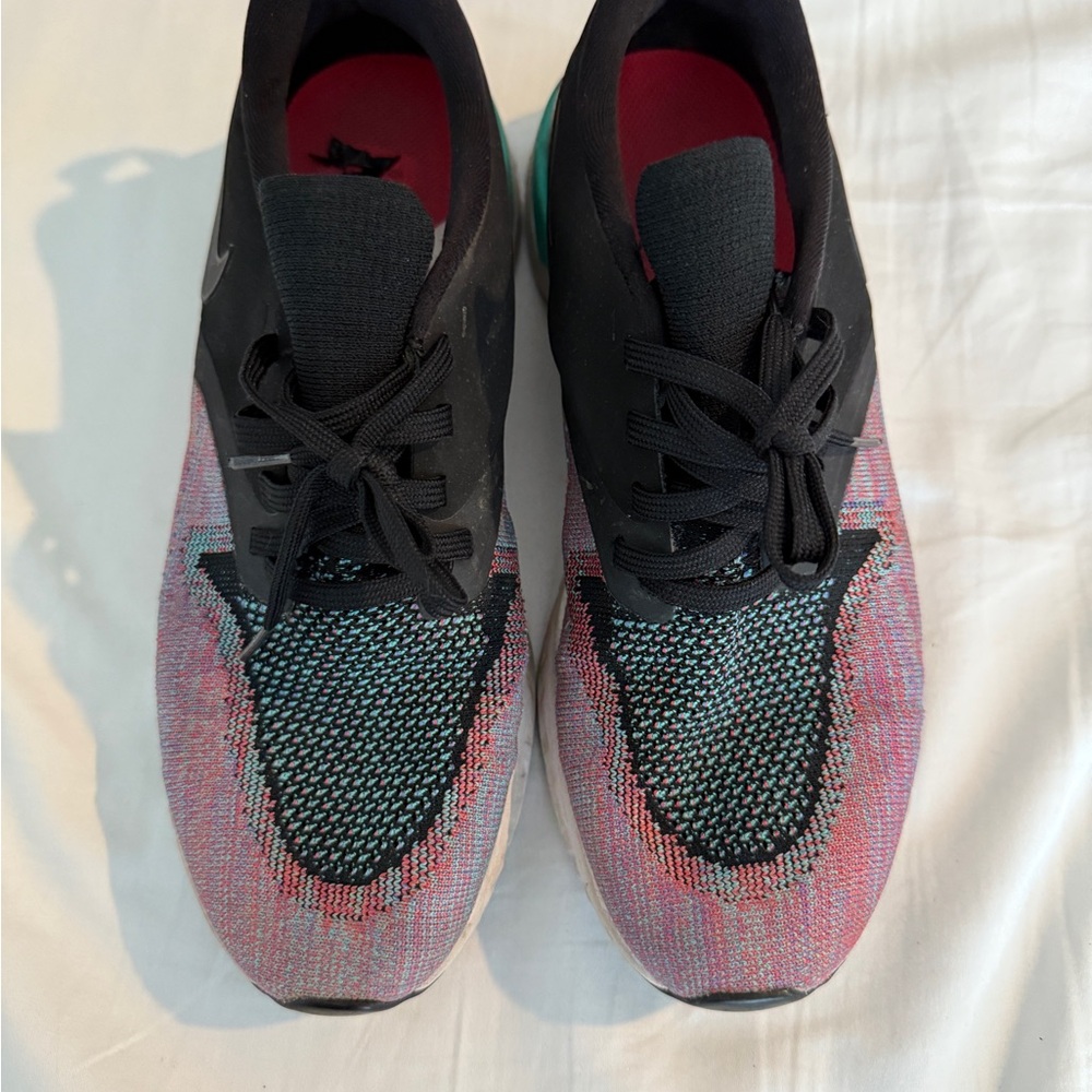 Nike Women’s Odyssey React 2 Flyknit. Black/Hyper Jade-Ember Glow-Sapphire.
